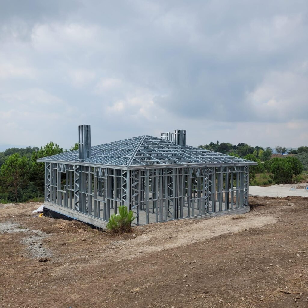 Steel frame of a single-storey house with a hipped roof